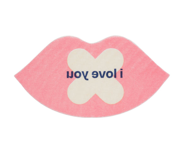 Pink lip mouth tape that says "i love you"