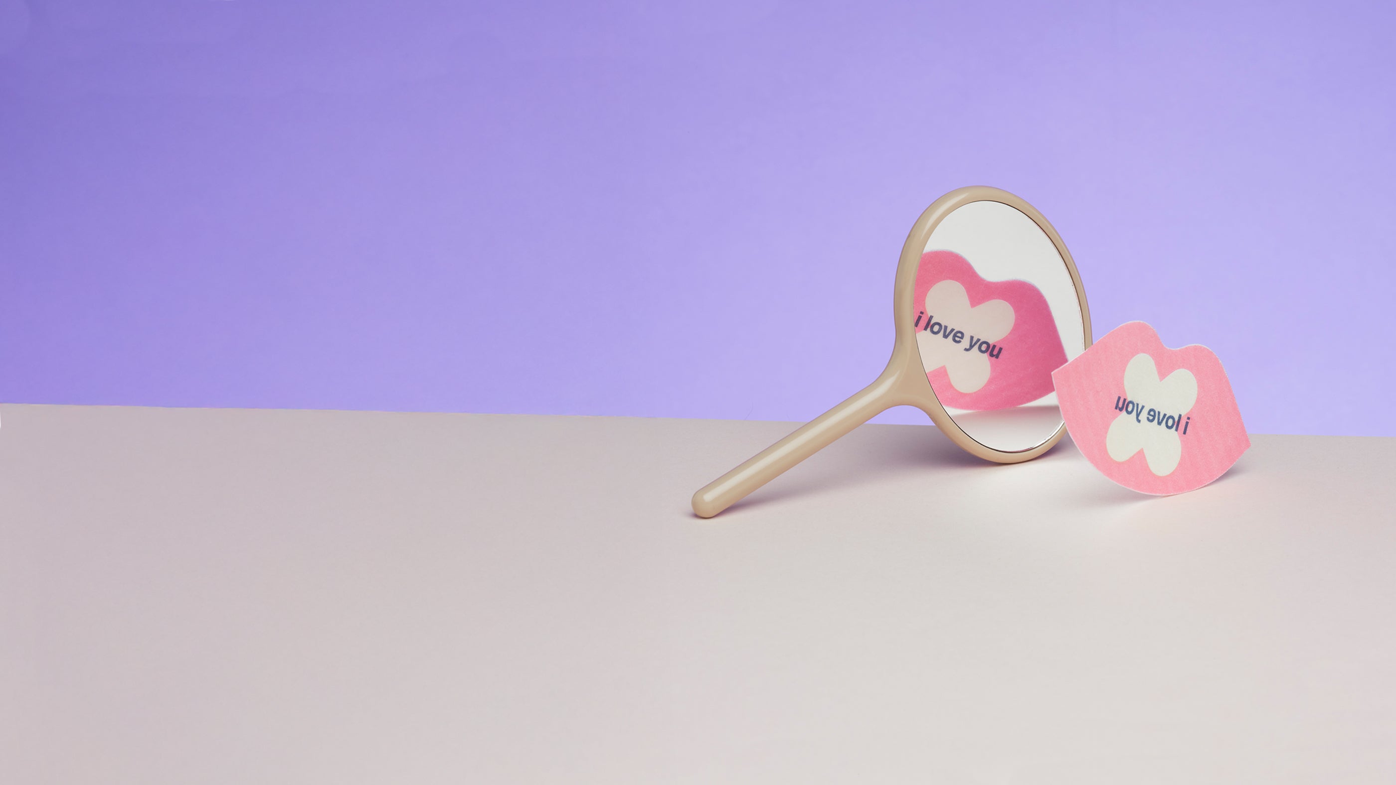 We Shut It bamboo mouth tapes for better sleep in front of a mirror with affirmation: "i love you".